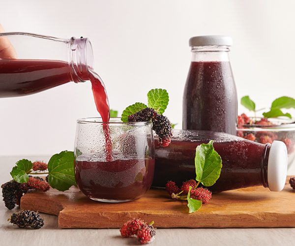 Raw Kombucha made with fruit, herbs and fermented tea